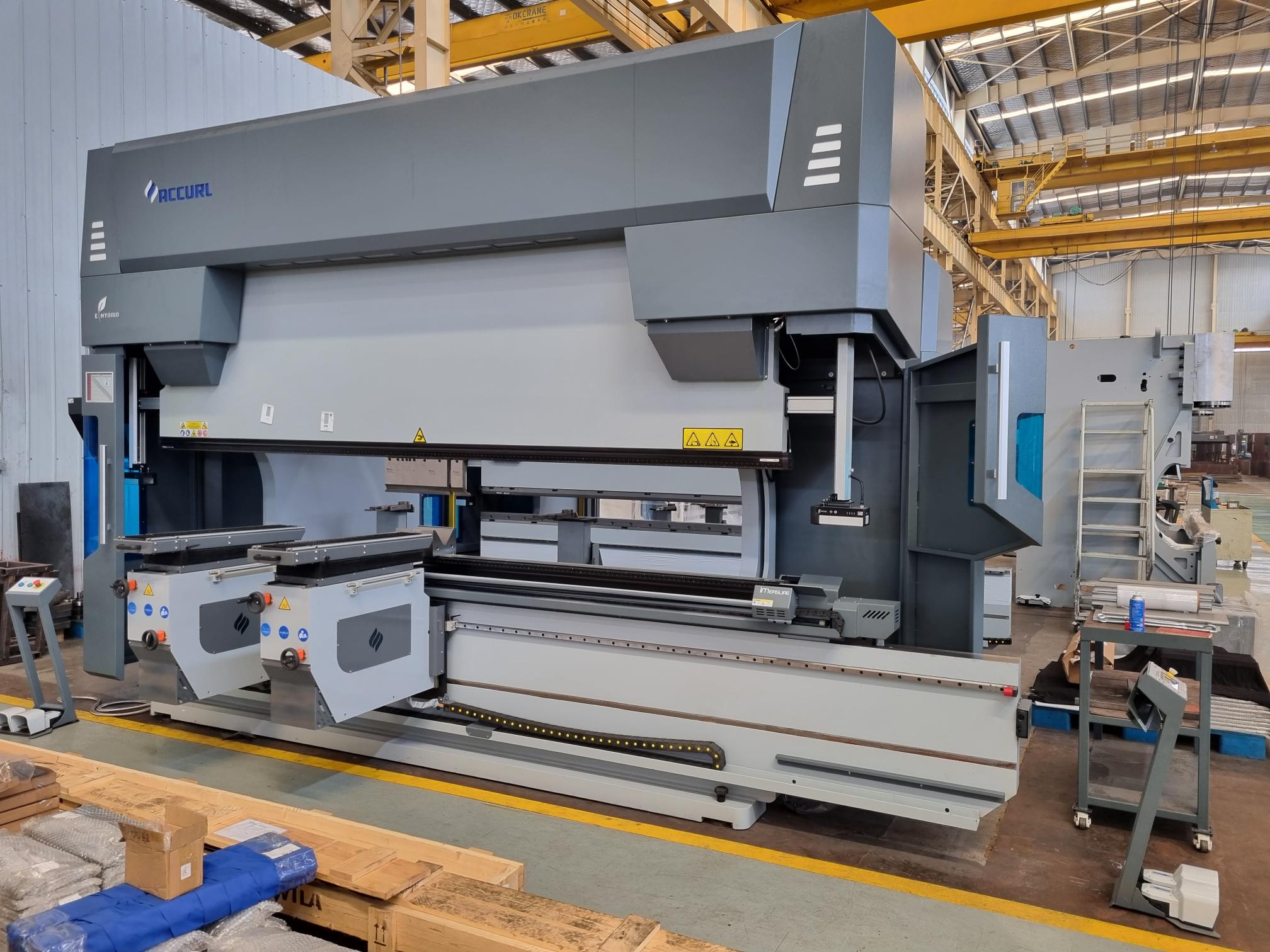 Pressbrakes Explained: Types, Sizes and Materials 2 Pressbrake with sheet folowers.jpg